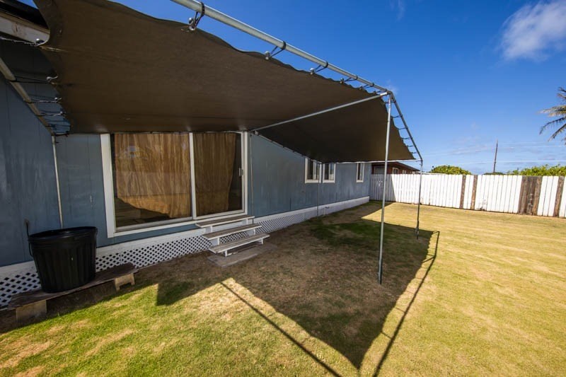4541 Panihi Road Kapaa, HI 96746 - Photo 24 of 30 a view of a backyard with a patio