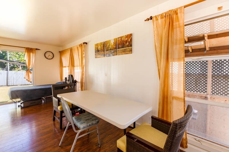 4541 Panihi Road Kapaa, HI 96746 - Photo 5 of 30 a view of a dining room with furniture and wooden floor