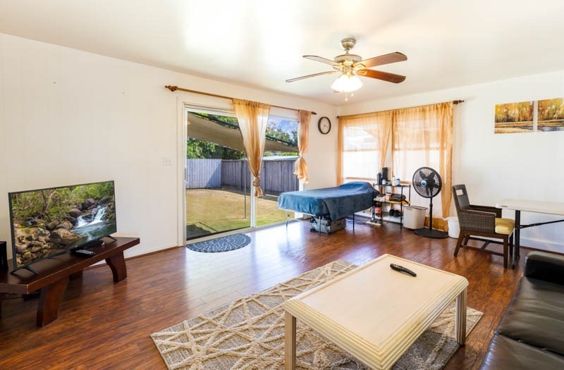 4541 Panihi Road Kapaa, HI 96746 - Photo 7 of 30 a living room with furniture and a large window