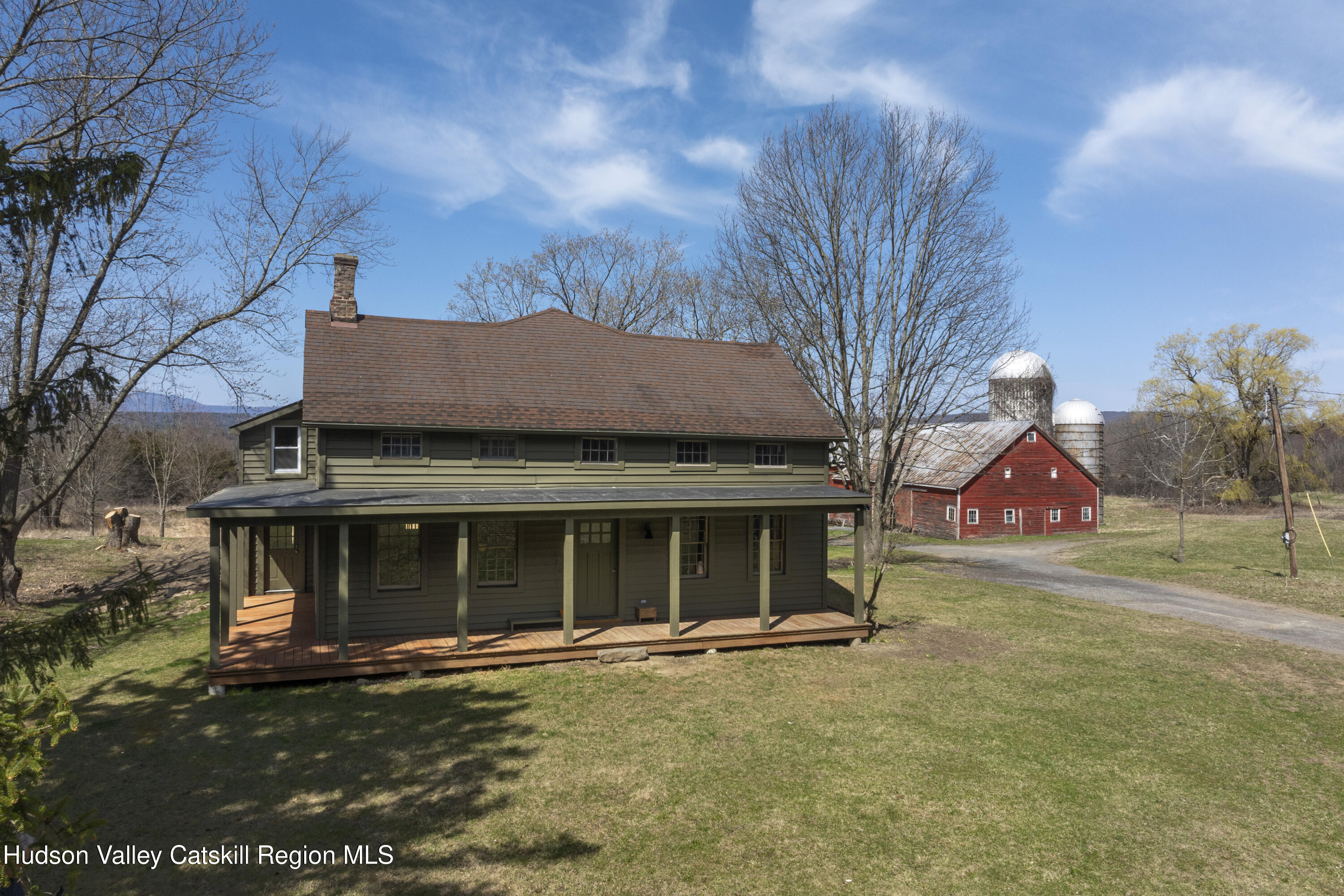 857 Flats Road Athens, NY 12015 - Photo 1 of 30 a view of a house with a yard and garage