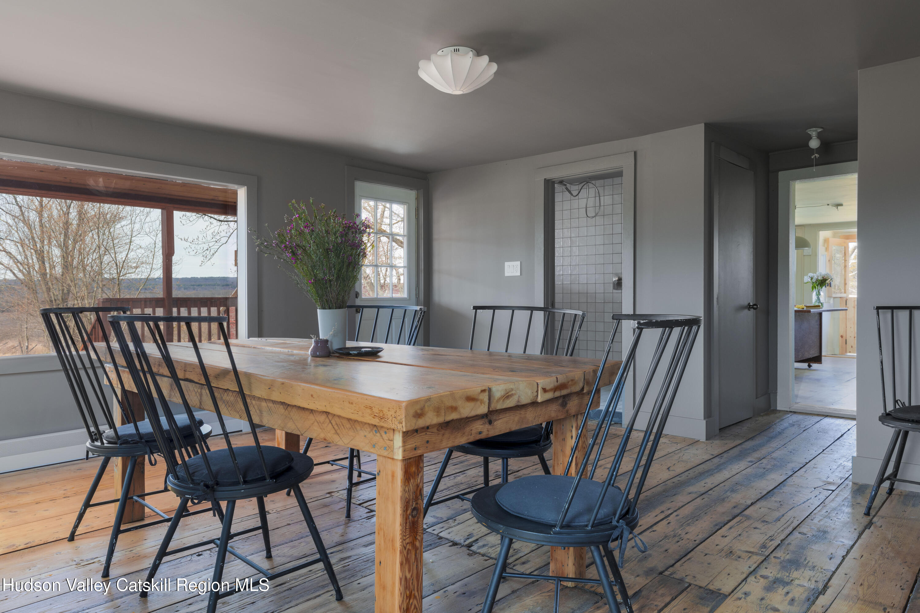 857 Flats Road Athens, NY 12015 - Photo 14 of 30 a view of a dining room with furniture and window