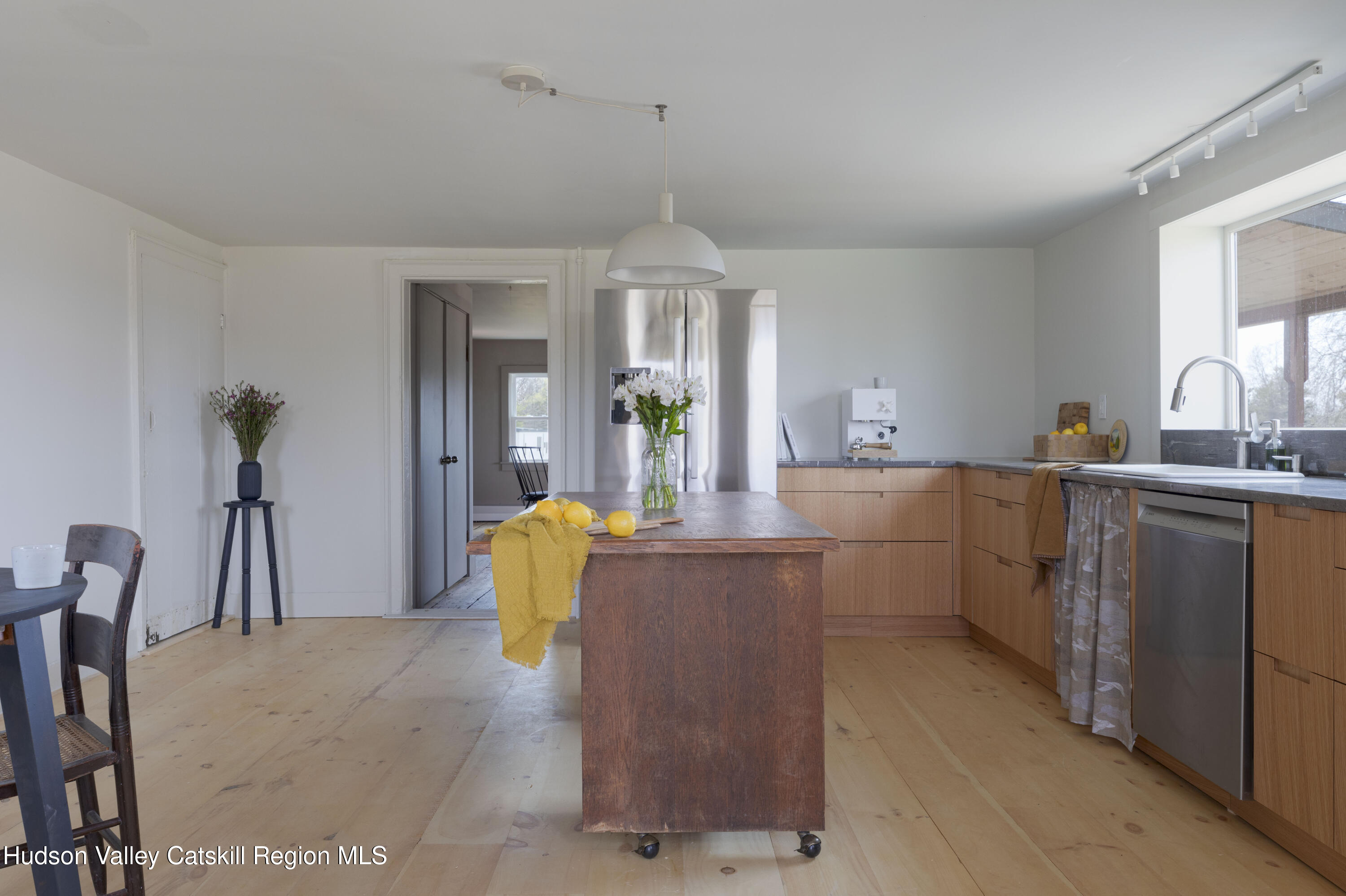 857 Flats Road Athens, NY 12015 - Photo 16 of 30 a dining hall with granite countertop a sink dishwasher stove and cabinets