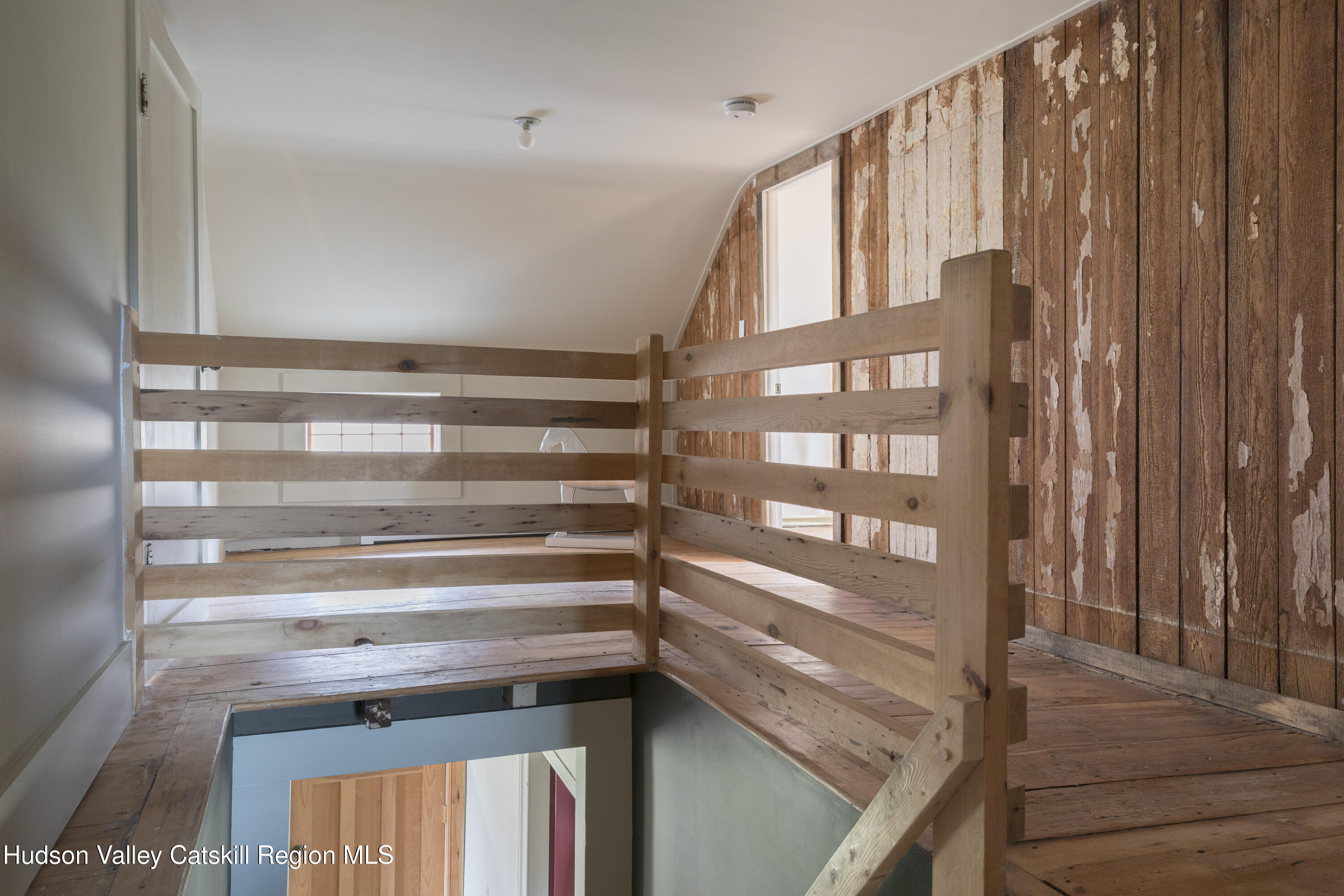 857 Flats Road Athens, NY 12015 - Photo 20 of 30 a view of walk in closet with empty racks