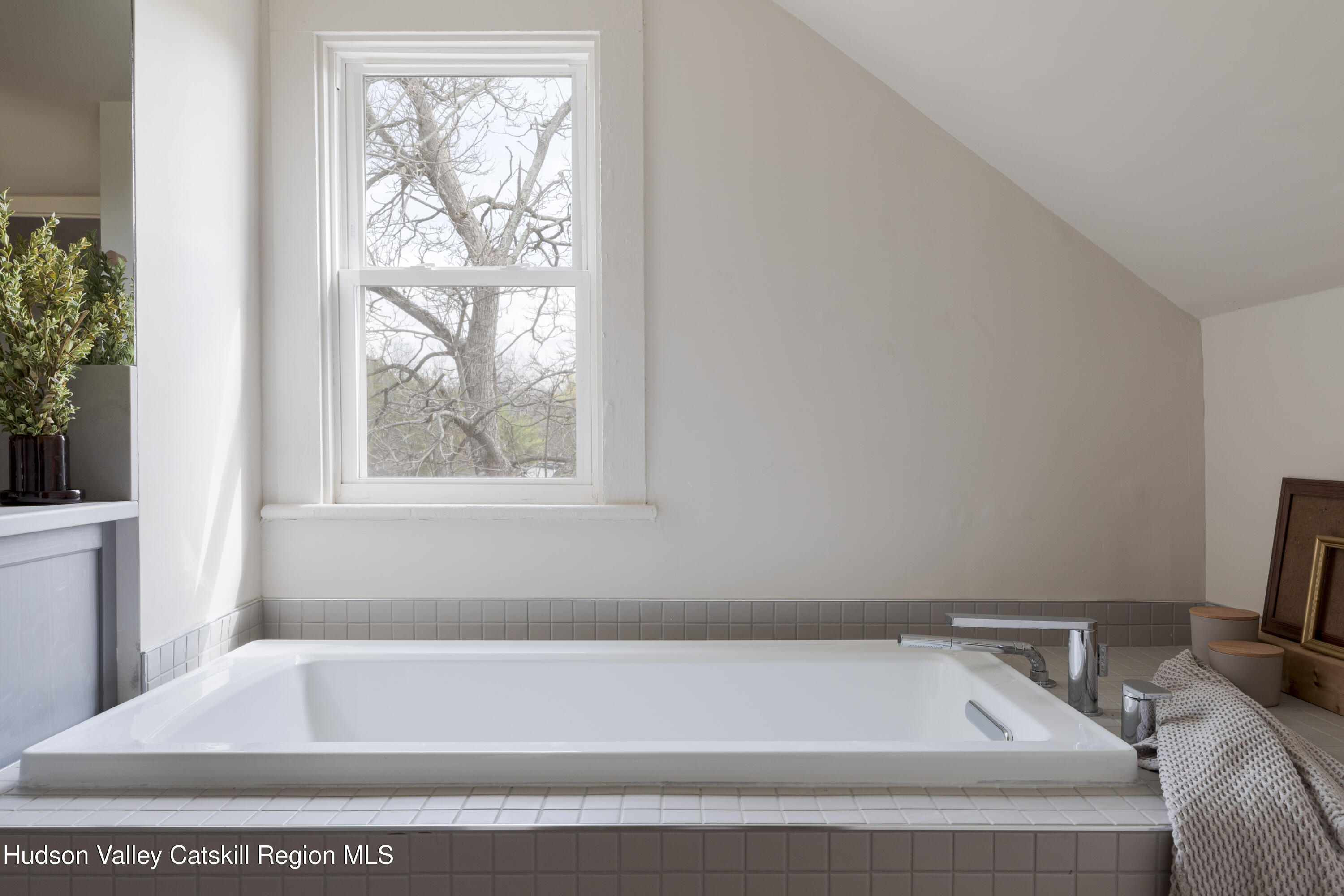 857 Flats Road Athens, NY 12015 - Photo 4 of 30 a bathroom with a bathtub and window