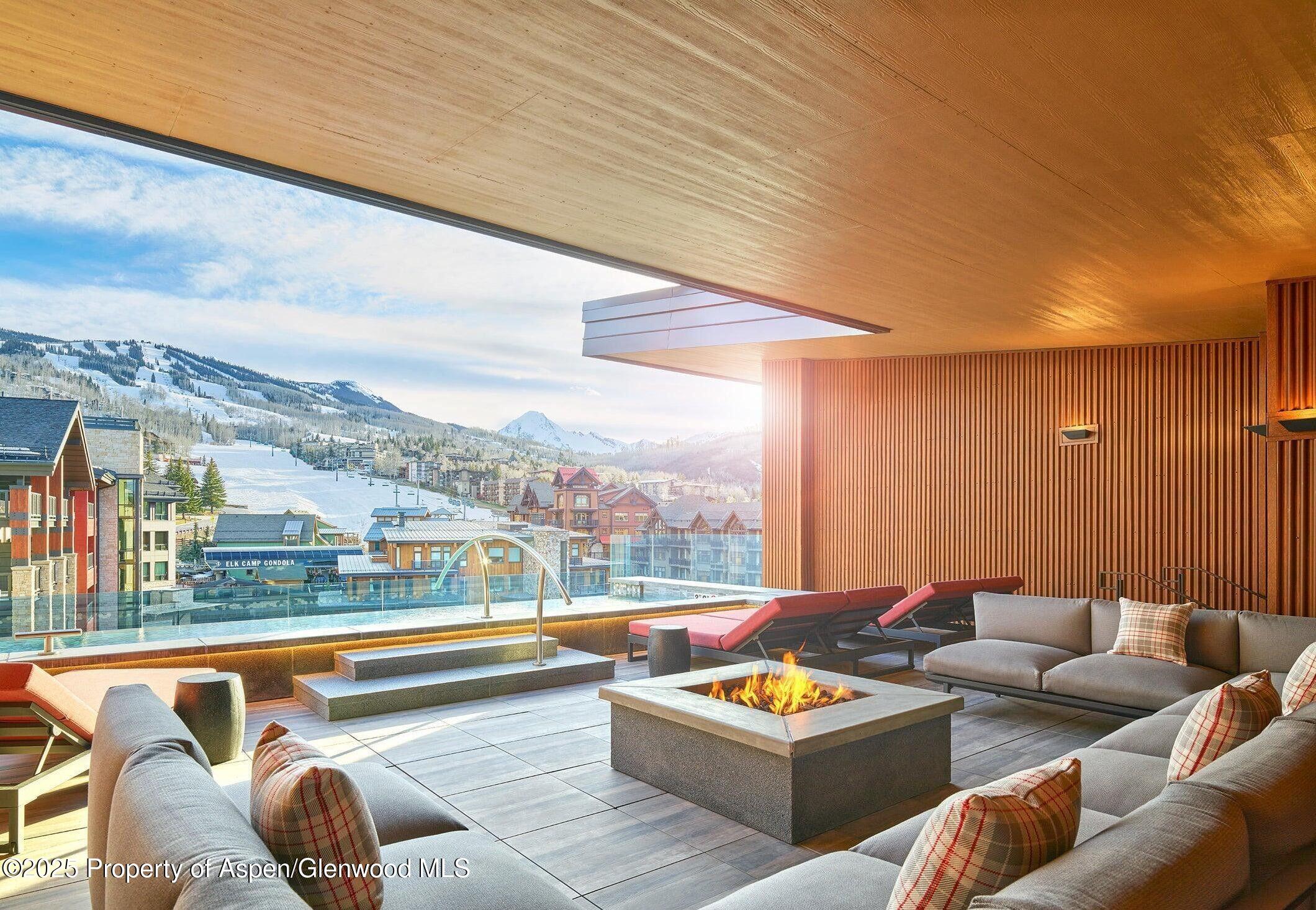 77 Wood Road, Unit 503EAST Snowmass Village, CO 81615 - Photo 20 of 20 Roof Top Pool and Fire Pit