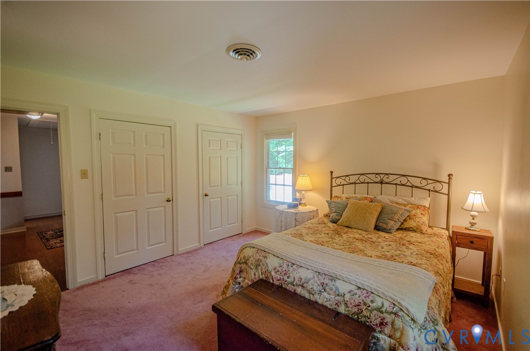 12500 Musical Lane Midlothian, VA 23113 - Photo 30 of 51 Carpeted room featuring a double-door closet, a si
