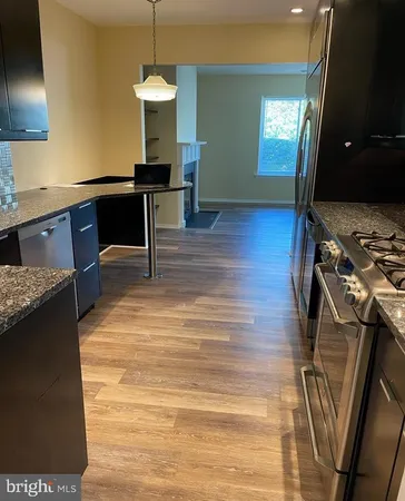 a room with furniture and a flat screen tv