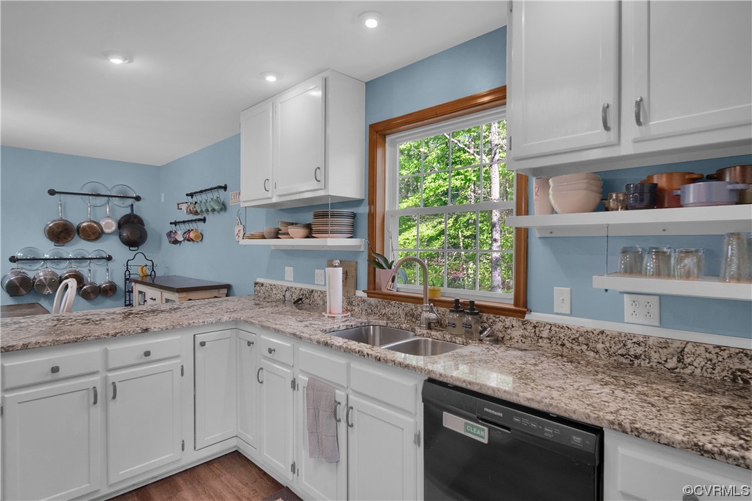 16116 Tyler Station Road Beaverdam, VA 23015 - Photo 12 of 50 a kitchen with a sink dishwasher window and cabinets