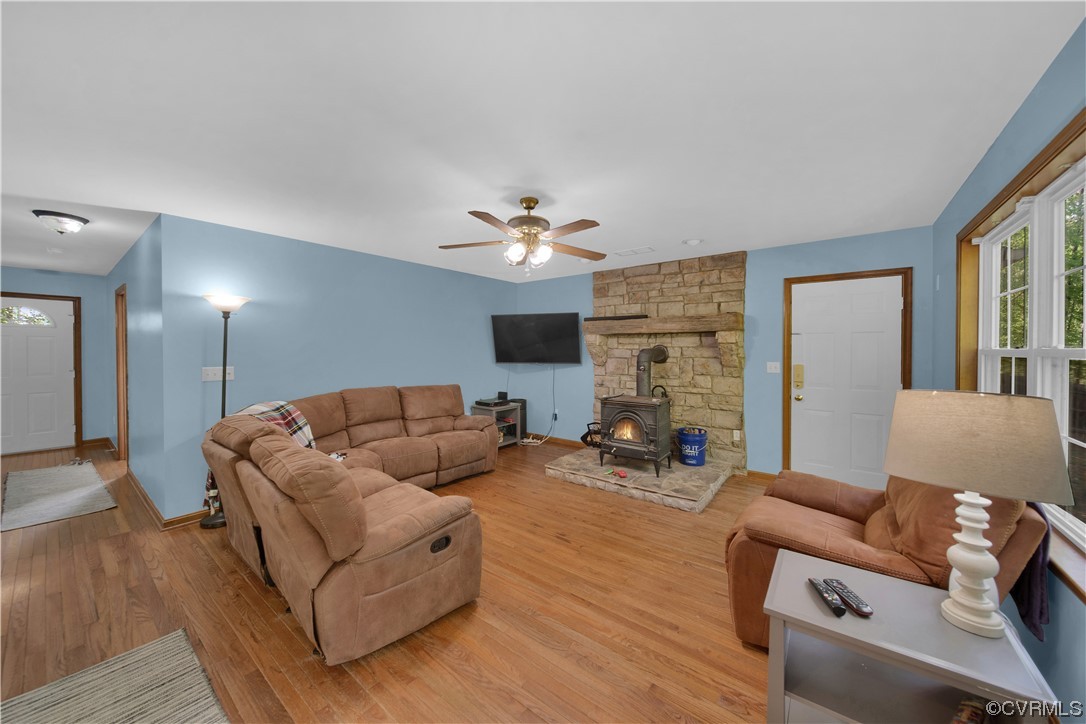 16116 Tyler Station Road Beaverdam, VA 23015 - Photo 18 of 50 a living room with furniture and a flat screen tv