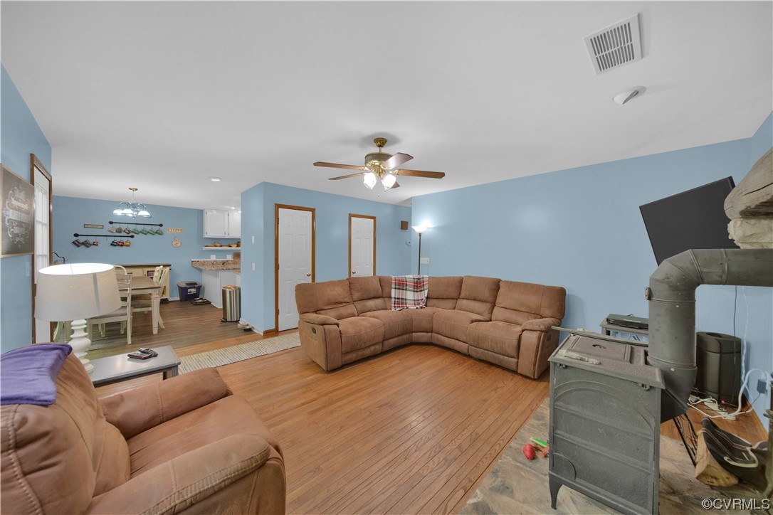 16116 Tyler Station Road Beaverdam, VA 23015 - Photo 19 of 50 a living room with furniture and a chandelier