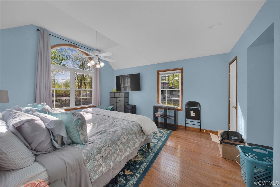 16116 Tyler Station Road Beaverdam, VA 23015 - Photo 23 of 50 a living room with a bed furniture and a large window