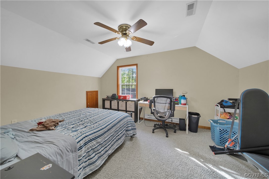 16116 Tyler Station Road Beaverdam, VA 23015 - Photo 30 of 50 a bedroom that has a bed and a chair in it