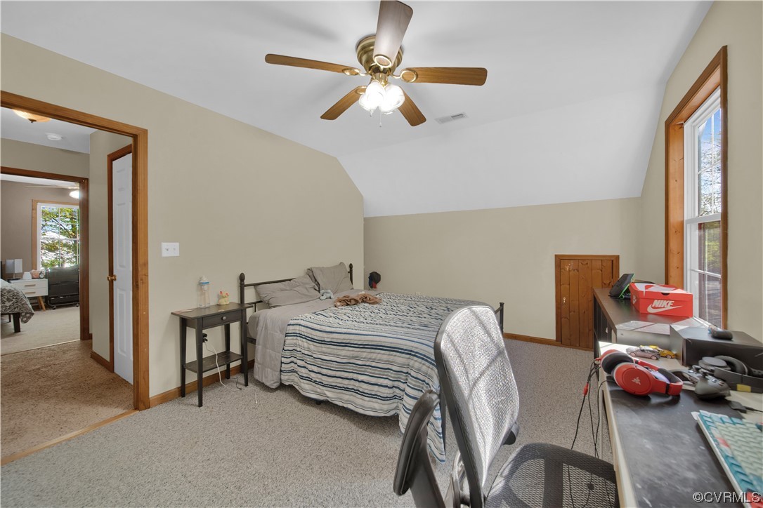 16116 Tyler Station Road Beaverdam, VA 23015 - Photo 31 of 50 a bedroom with furniture and a chandelier