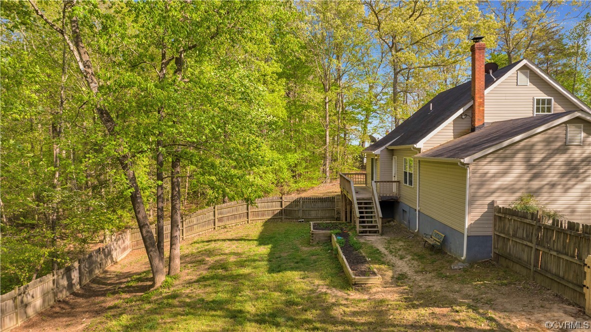 16116 Tyler Station Road Beaverdam, VA 23015 - Photo 39 of 50 a view of a house with basketball court