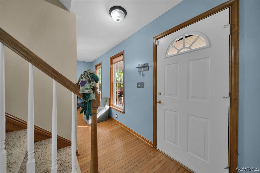 16116 Tyler Station Road Beaverdam, VA 23015 - Photo 8 of 50 a view of a hallway with wooden floor and staircase