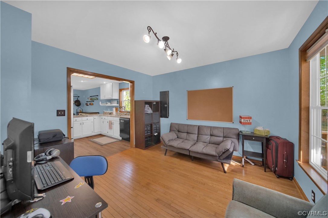 16116 Tyler Station Road Beaverdam, VA 23015 - Photo 9 of 50 a living room with furniture and a flat screen tv