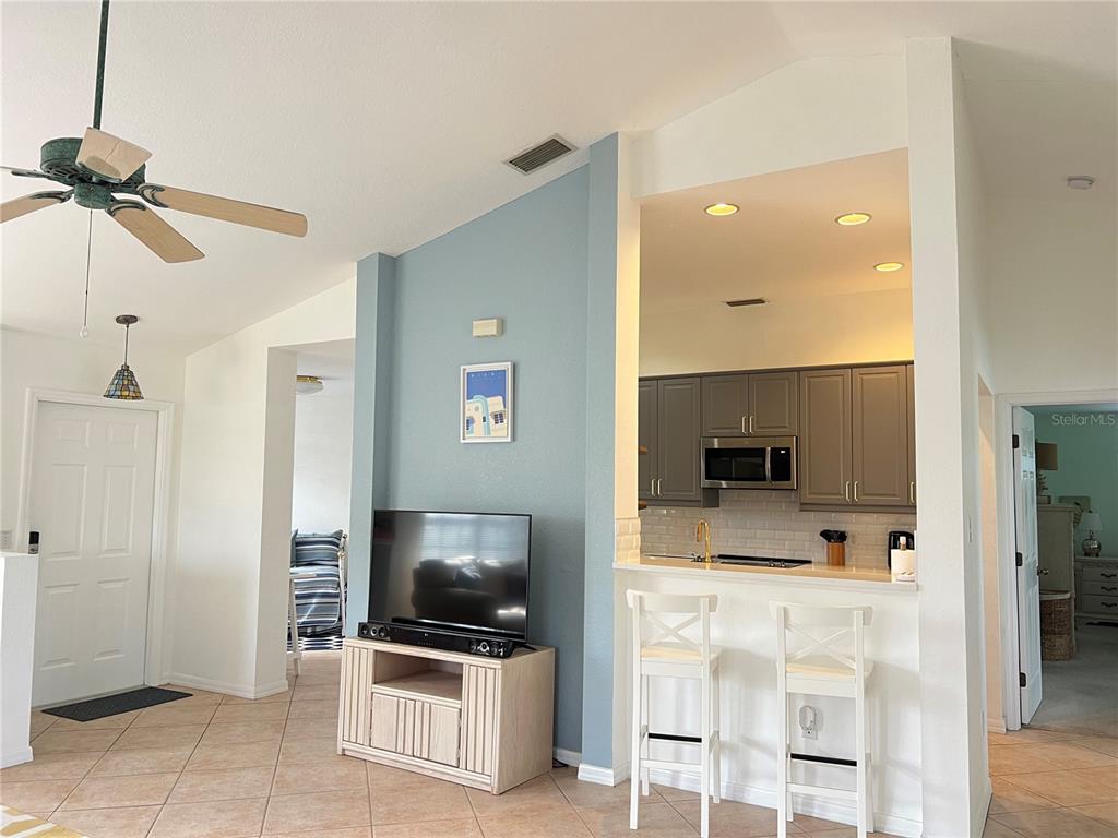 4005 Big Pass Lane Punta Gorda, FL 33955 - Photo 15 of 42 a view of kitchen with sink microwave and refrigerator