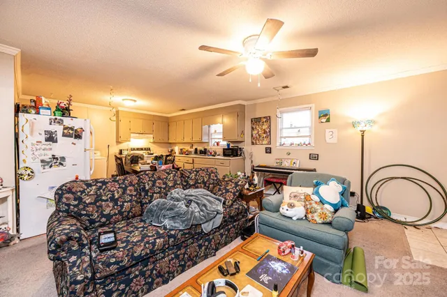 a bed room with furniture and a chandelier