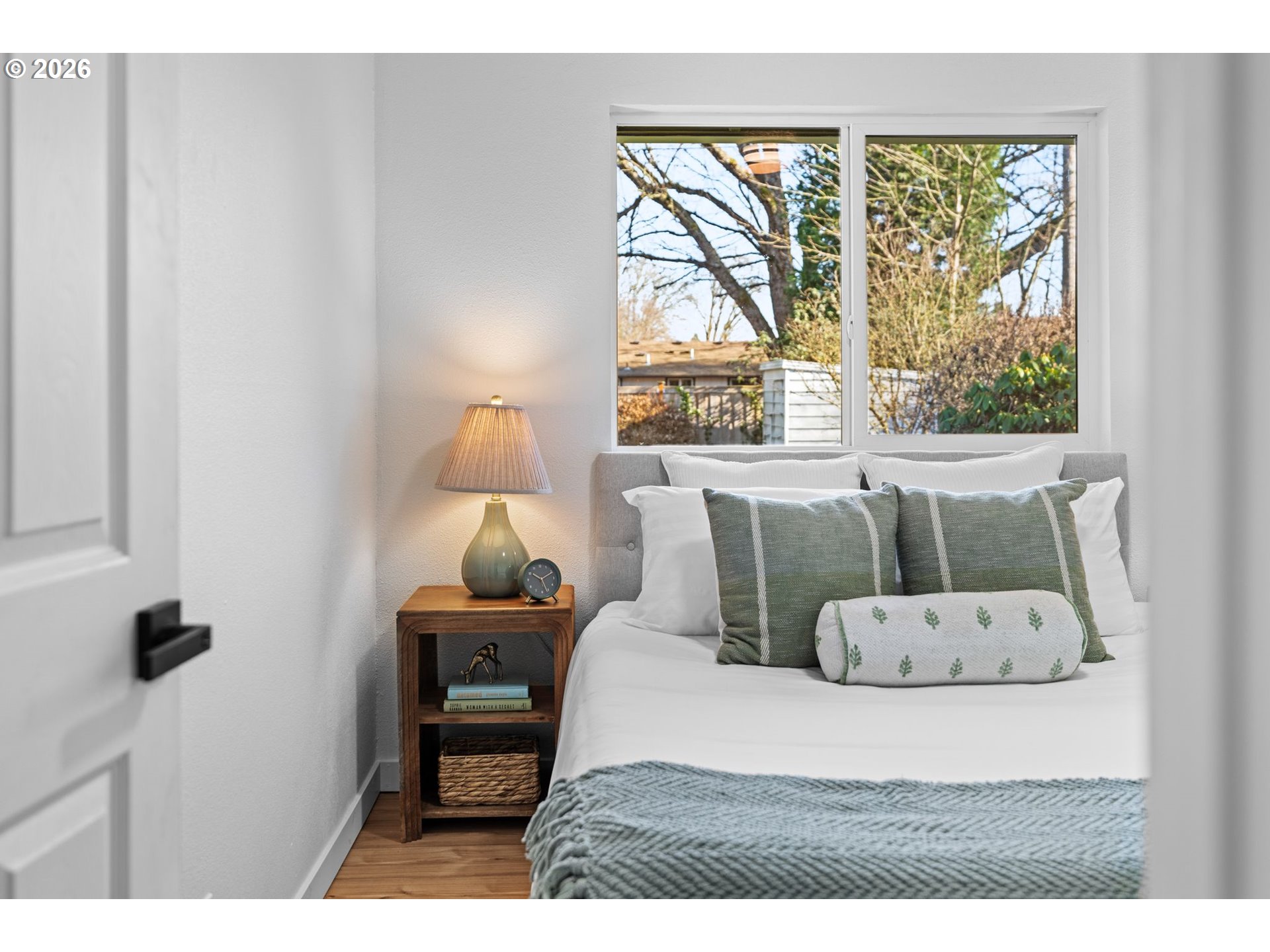 2583 Stratford Street Eugene, OR 97404 - Photo 18 of 31 a bedroom with a bed and wooden floor