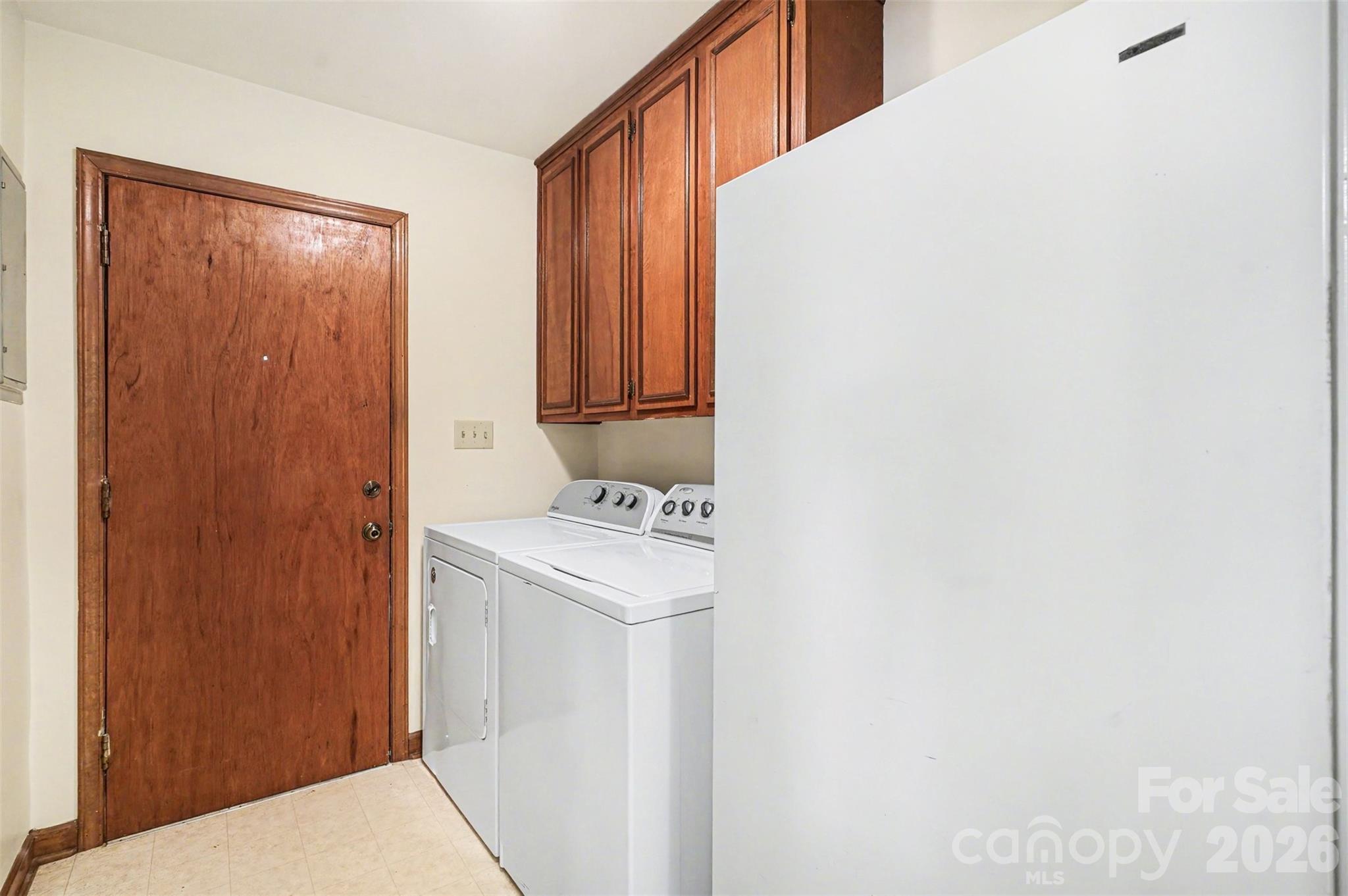 2116 Rice Road Matthews, NC 28105 - Photo 12 of 15 a utility room with dryer and washer