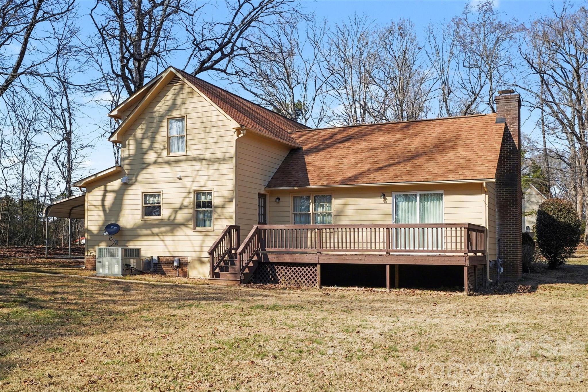 2116 Rice Road Matthews, NC 28105 - Photo 13 of 15 a view of a house with a snow in the yard