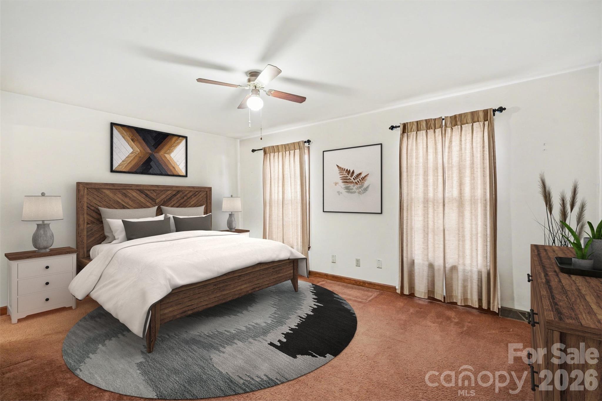 2116 Rice Road Matthews, NC 28105 - Photo 7 of 15 a bedroom with a large bed and a window