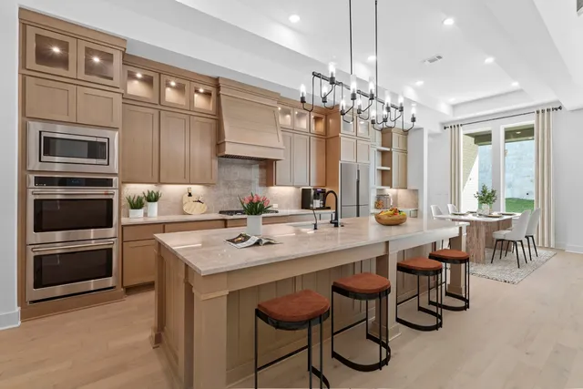a kitchen with counter space cabinets and appliances