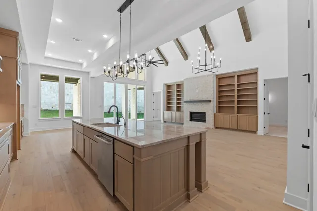 a large kitchen with a large counter top