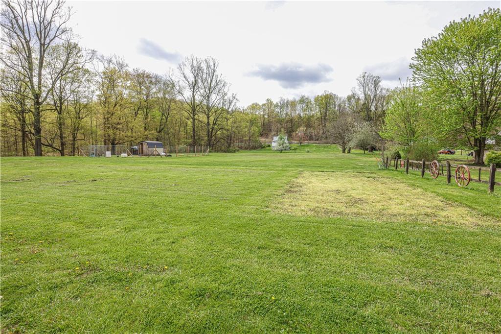 116 Post Road Dilliner, PA 15327 - Photo 8 of 21 a view of field with trees in the background