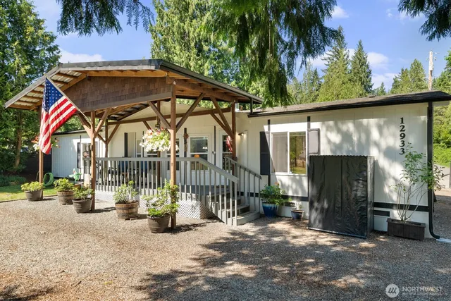 a view of outdoor space with deck and furniture