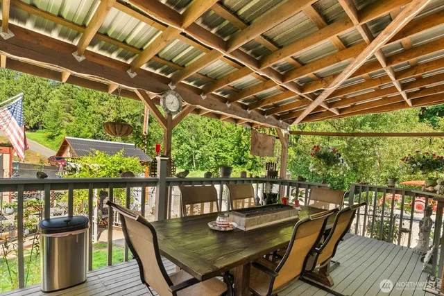 a view of a patio with wooden floor