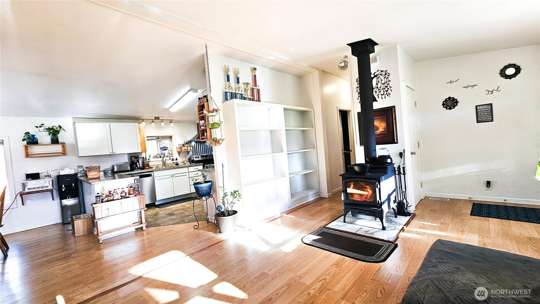 12933 Trout Farm Road Sultan, WA 98294 - Photo 5 of 38 a living room with furniture and a flat screen tv