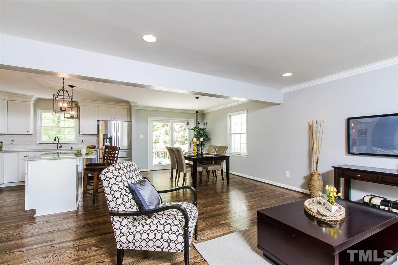 7617 Elliot Drive Raleigh, NC 27613 - Photo 4 of 25 a living room with furniture and wooden floor