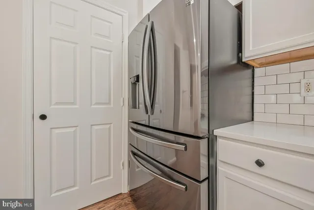 a view of a storage & utility room with closet