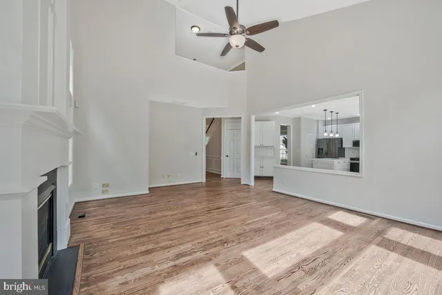 an empty room with a empty space and a window