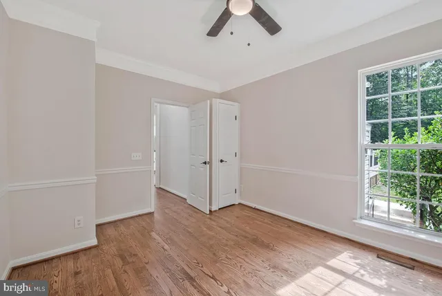 a bathroom with a sink a toilet and vanity