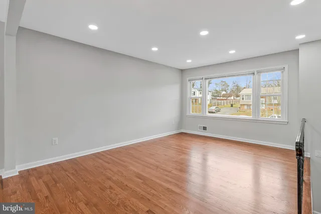 a kitchen with stainless steel appliances a refrigerator sink and cabinets