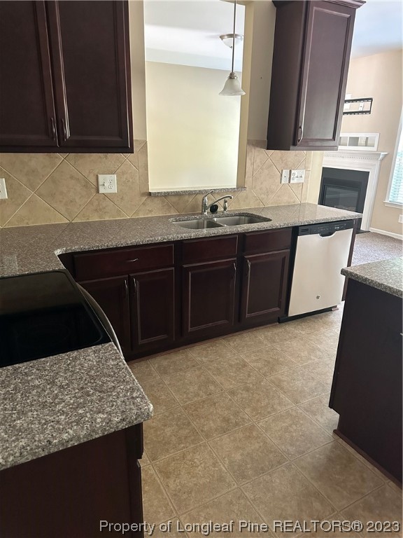 73 Blue Bay Lane Cameron, NC 28326 - Photo 11 of 42 a kitchen with a sink a stove and a microwave