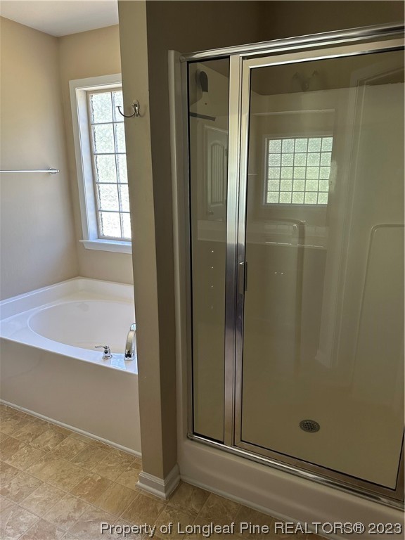 73 Blue Bay Lane Cameron, NC 28326 - Photo 17 of 42 a bathroom with a bathtub and shower
