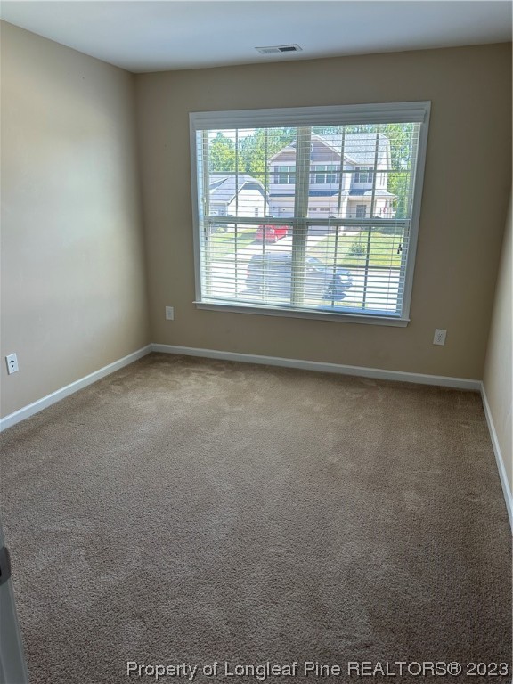73 Blue Bay Lane Cameron, NC 28326 - Photo 20 of 42 an empty room with a window