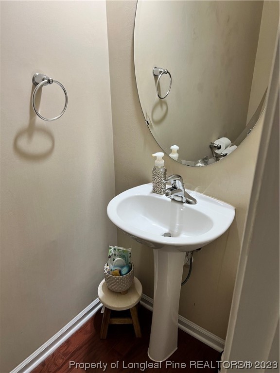 73 Blue Bay Lane Cameron, NC 28326 - Photo 24 of 42 a bathroom with a toilet sink and mirror