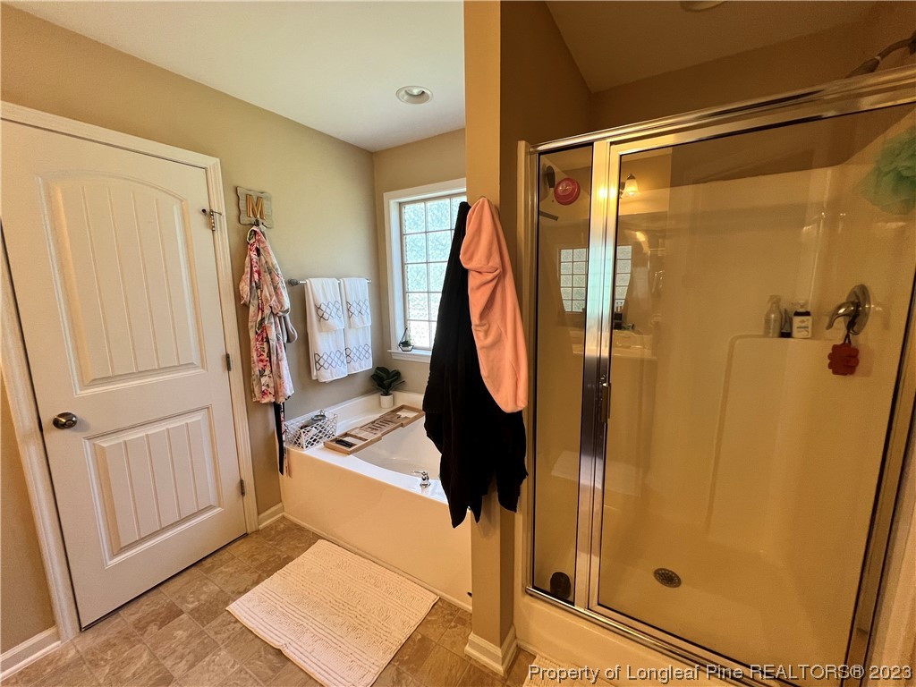 73 Blue Bay Lane Cameron, NC 28326 - Photo 40 of 42 a bathroom with a shower