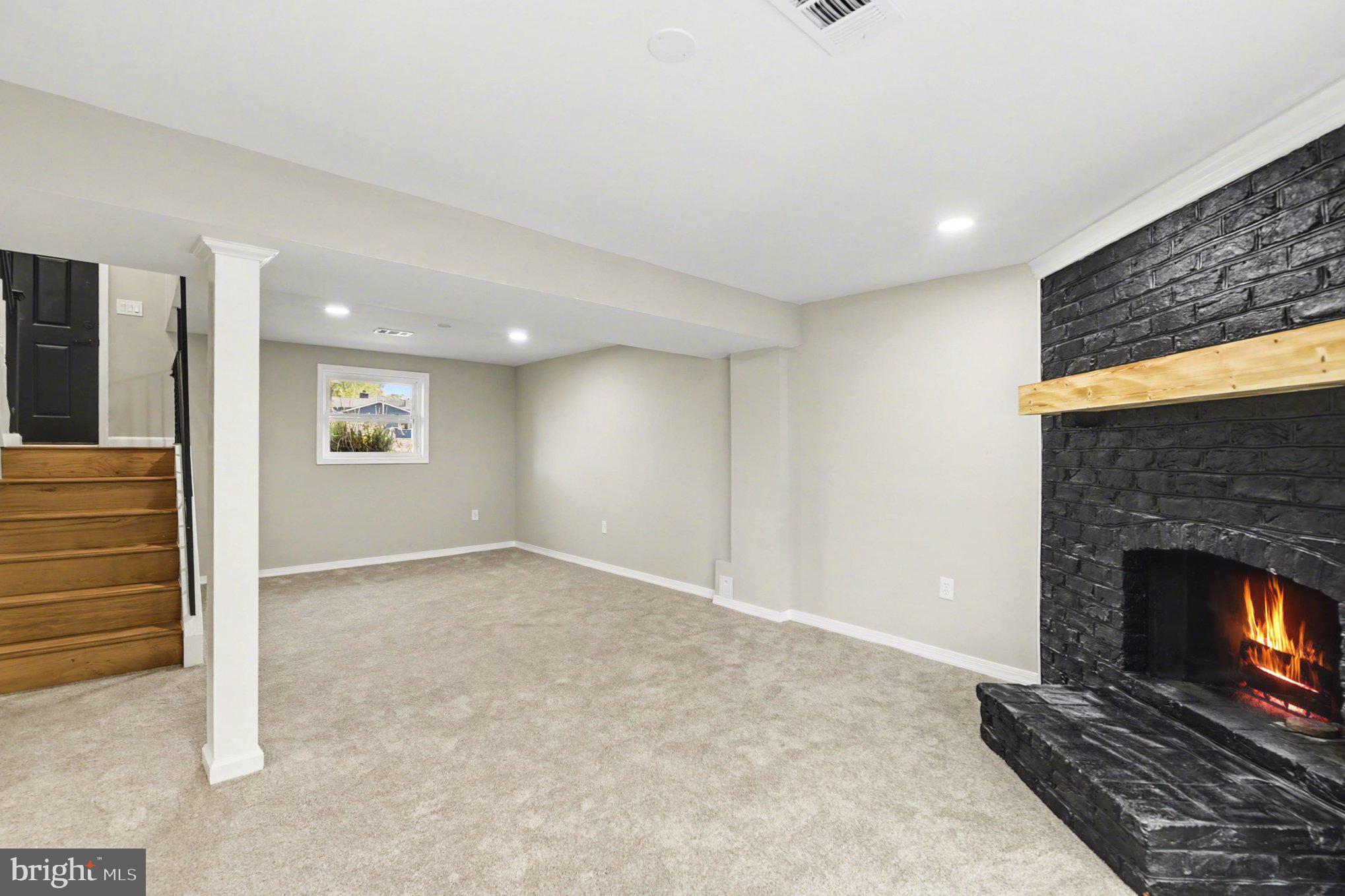 3010 Marlin Drive Riva, MD 21140 - Photo 15 of 26 Fully Finished Basement w/ Fireplace