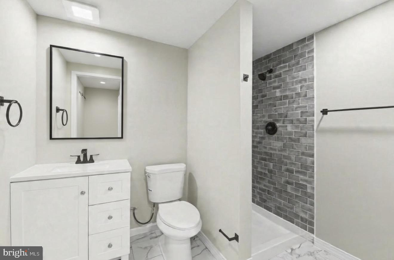 3010 Marlin Drive Riva, MD 21140 - Photo 18 of 26 Sleek modern bathroom with stylish finishes.