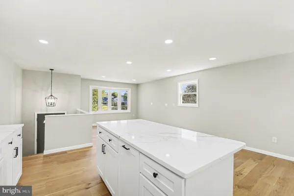 a bathroom with a toilet sink and shower