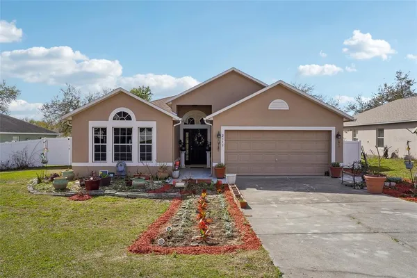 a front view of a house with patio