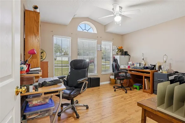 a bathroom with a sink toilet and a mirror