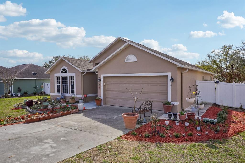 2315 Belfry Way Mascotte, FL 34753 - Photo 3 of 55 a view of a house with a patio