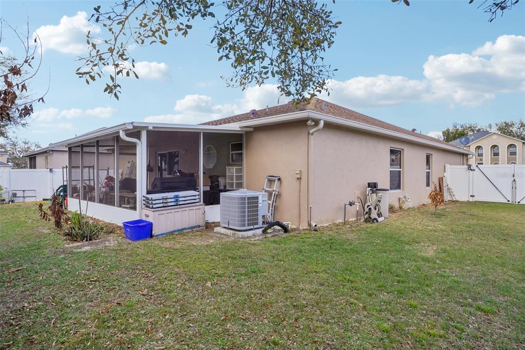 2315 Belfry Way Mascotte, FL 34753 - Photo 42 of 55 a front view of house with yard