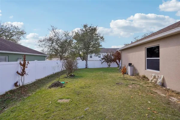 an aerial view of a house with a swimming pool